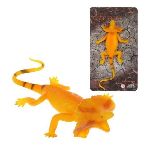 ящерица тянущаяся из мягкой резины, картон Ящерица тянущаяся из мягкой резины, картон